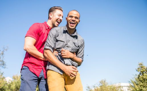 Two Men Couple Laughing
